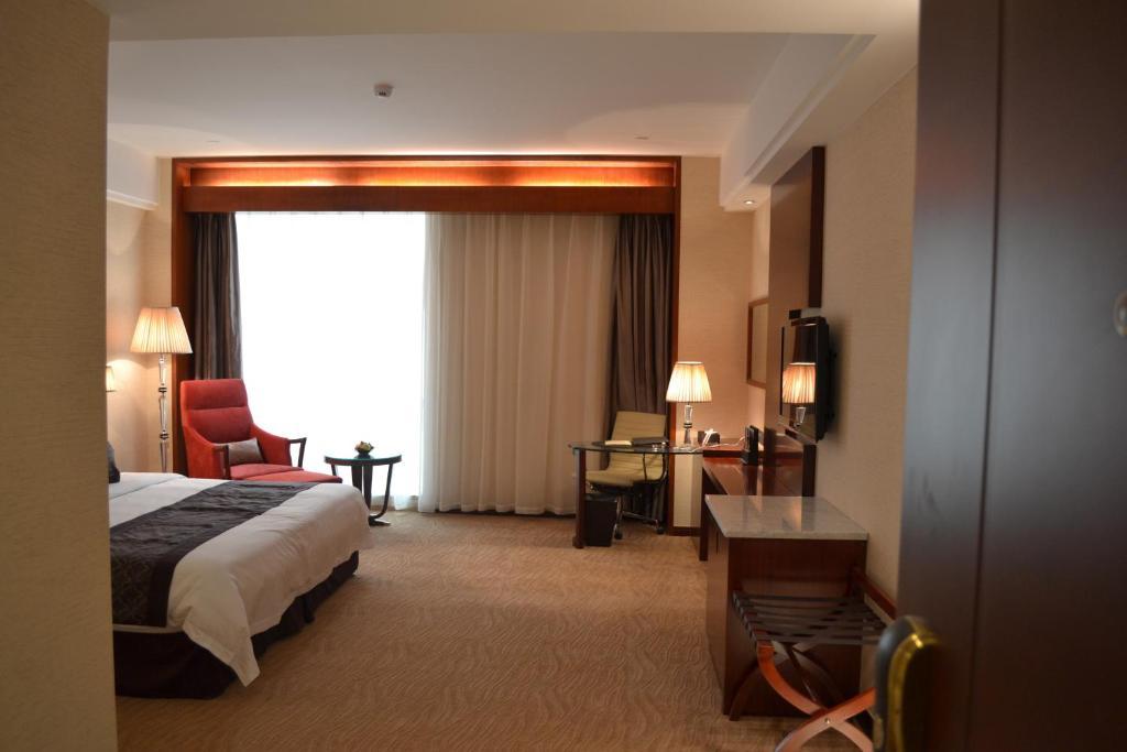 Wuhan Tianchimel Hotel Стая снимка